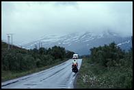 A typical Norwegian scene: snow fields, clouds, cold rain.